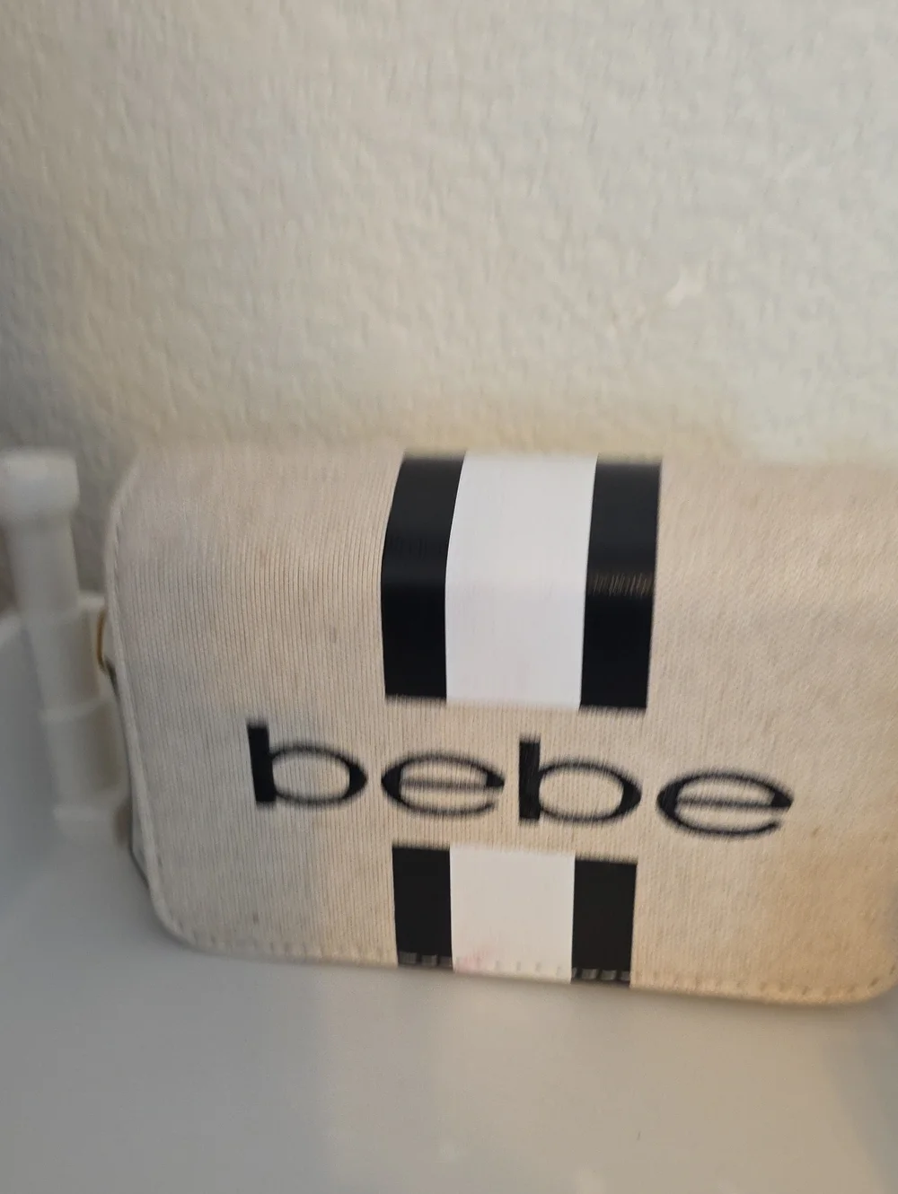 bebe Cream and Black Striped Cosmetic Case